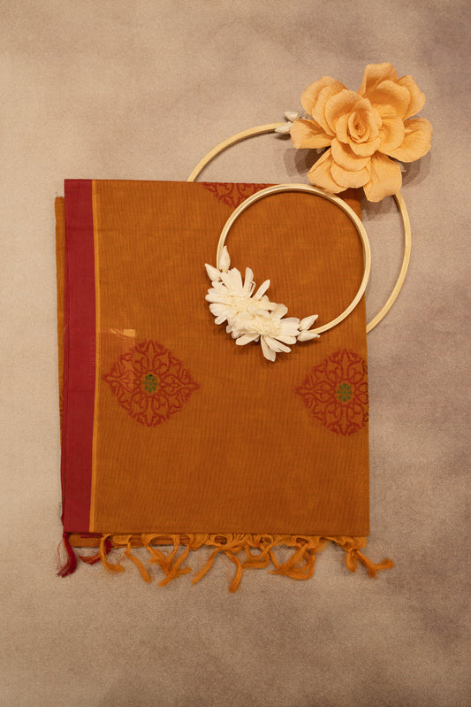 Orange cotton saree with Red boarder
