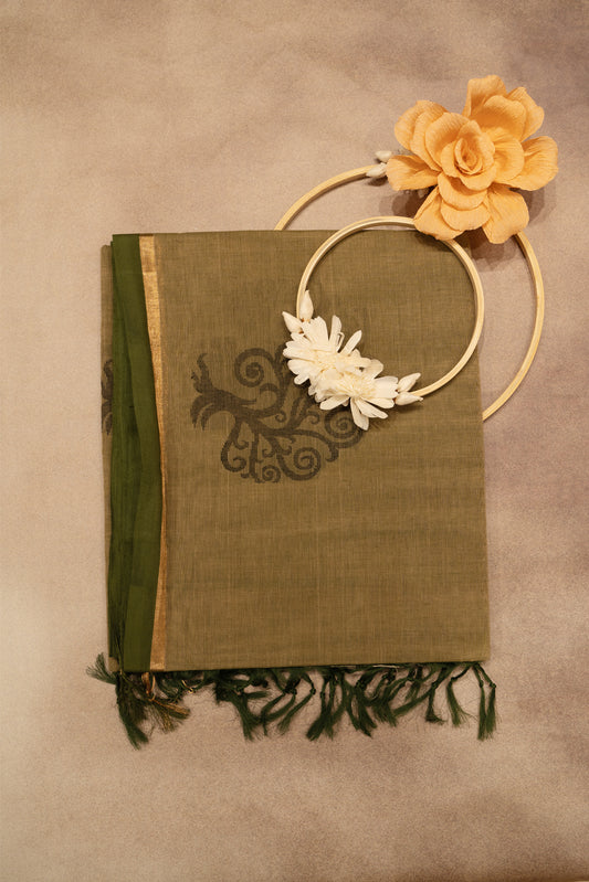 Dull gold saree with gold and olive green boarder