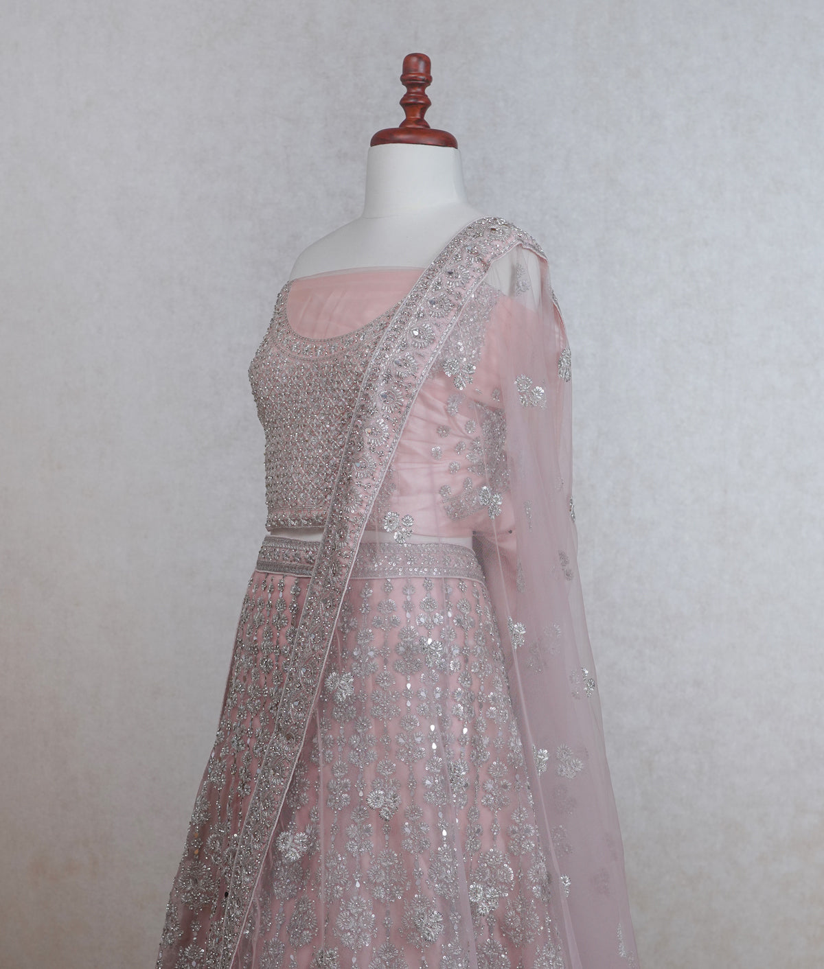 Pastel peach pink net lehenga