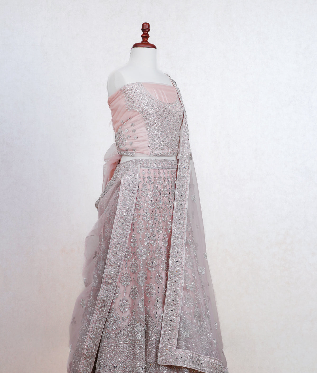 Pastel peach pink net lehenga