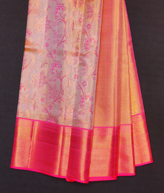 Golden kanchipuram saree with fluorescent pink border