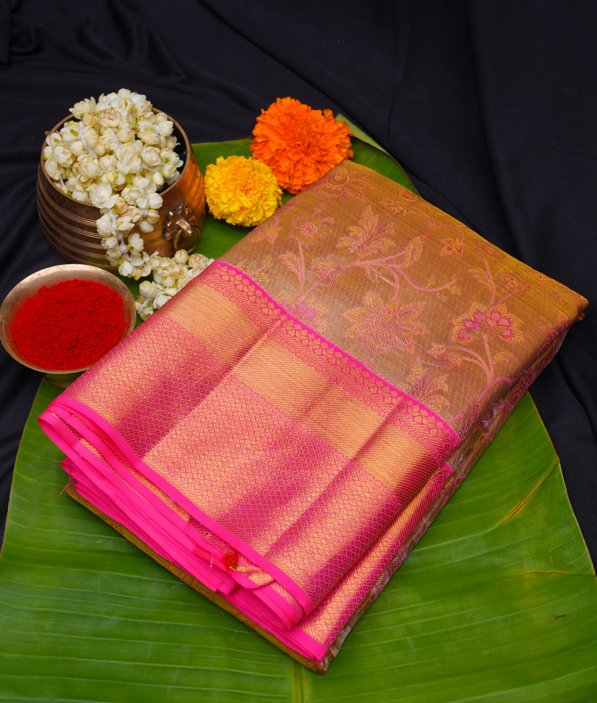 Golden kanchipuram saree with fluorescent pink border