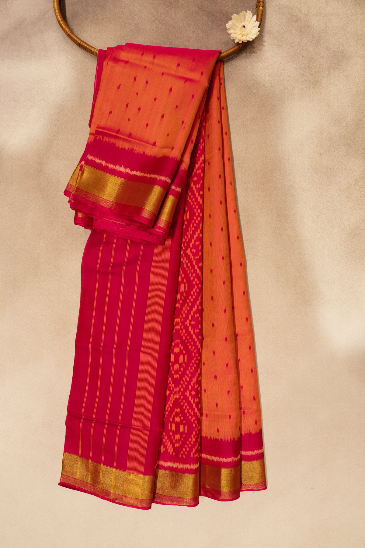 Orange double shaded patola saree with pink border