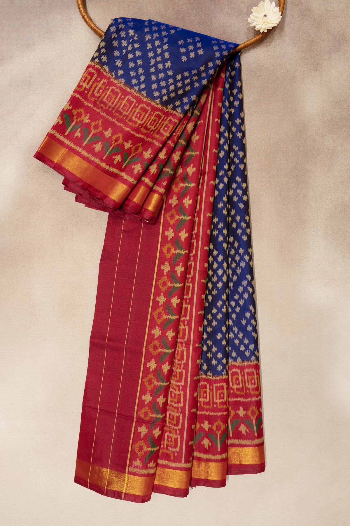 Blue patola saree with pink border